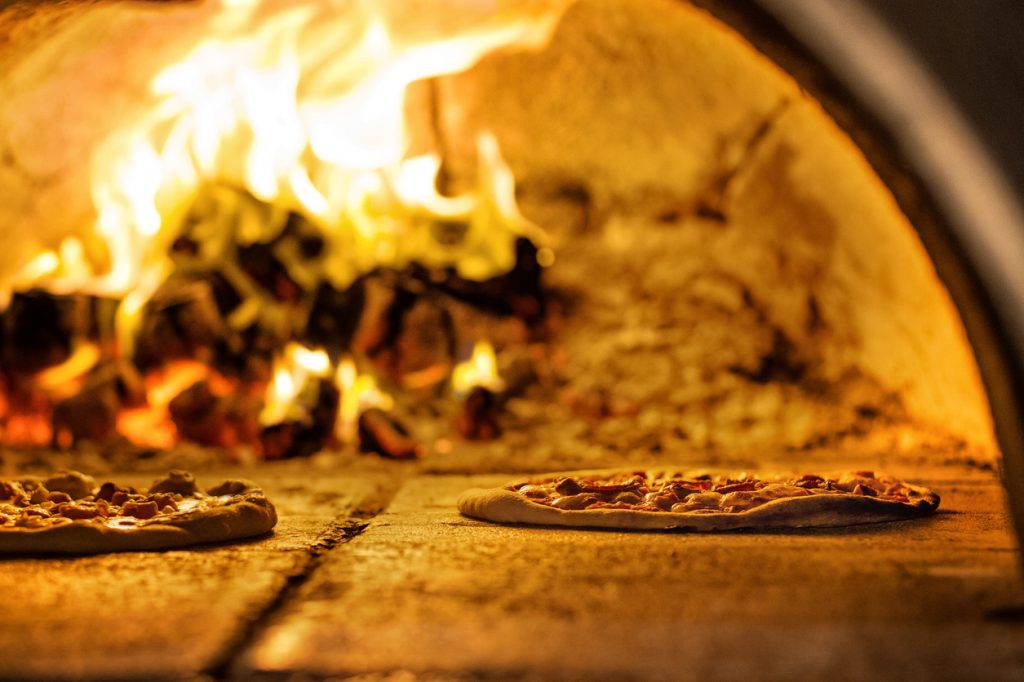 Pizza Places Baking In Traditional Oven